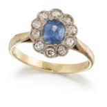 AN 18CT GOLD SAPPHIRE AND DIAMOND CLUSTER RING