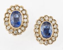 A PAIR OF 9CT GOLD SAPPHIRE AND DIAMOND CLUSTER EARRINGS