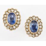 A PAIR OF 9CT GOLD SAPPHIRE AND DIAMOND CLUSTER EARRINGS