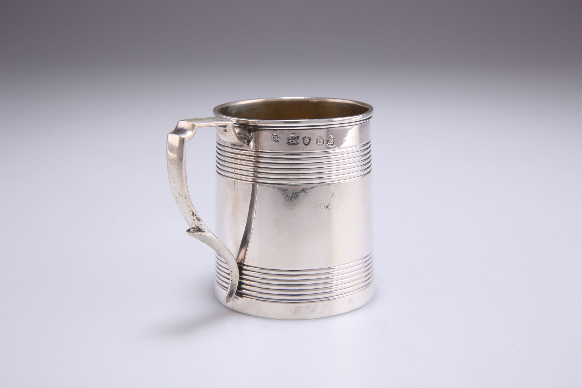 A GEORGE III SMALL SILVER MUG