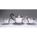 AN EDWARDIAN SILVER THREE-PIECE BACHELORS TEA SERVICE