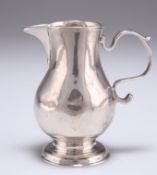 A GEORGE II SILVER SPARROW-BEAK CREAM JUG