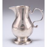 A GEORGE II SILVER SPARROW-BEAK CREAM JUG