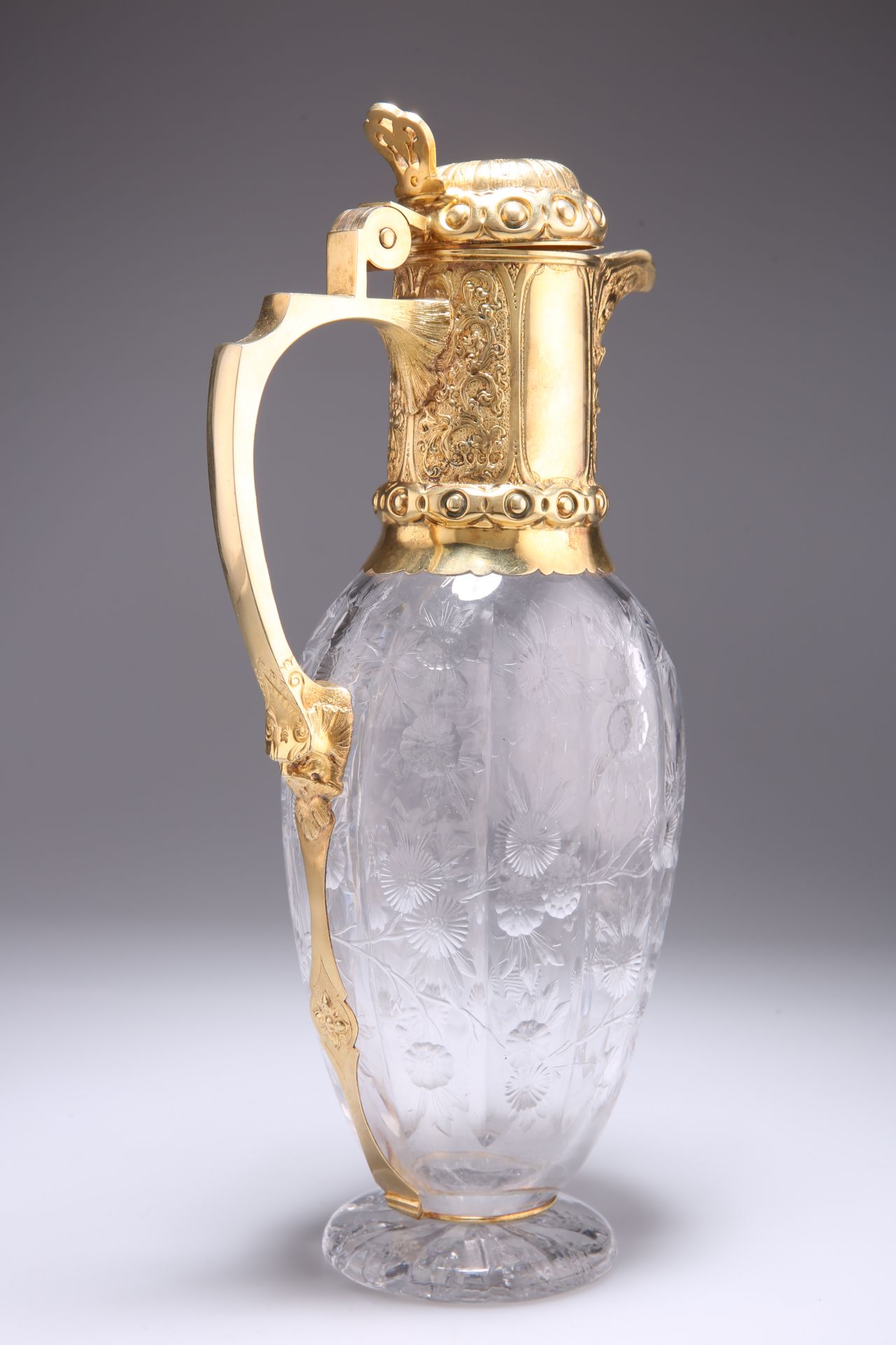 A VICTORIAN SILVER-GILT MOUNTED CUT-GLASS CLARET JUG - Bild 2 aus 3