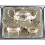 A VICTORIAN SILVER THREE-PIECE TEA SERVICE