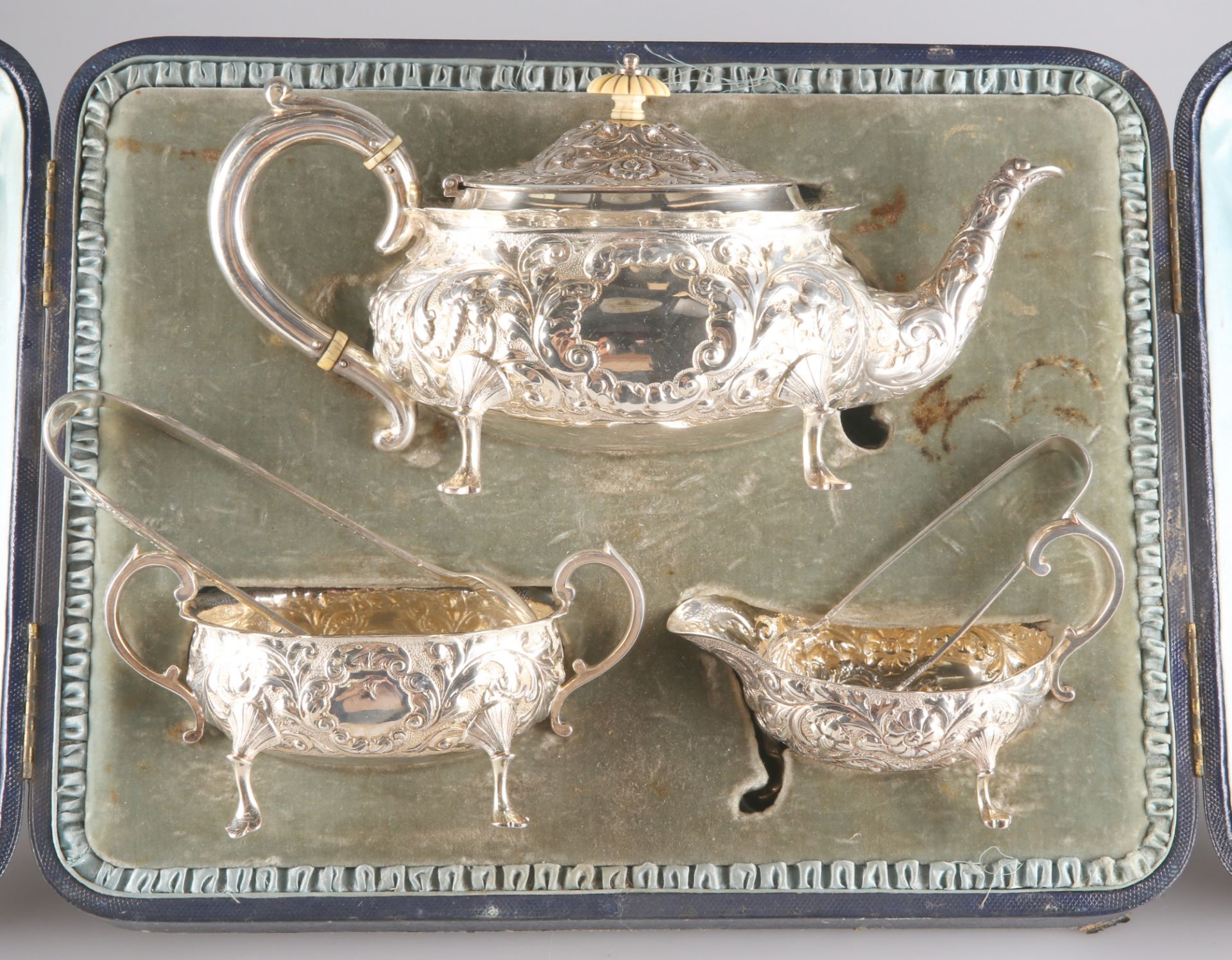 A VICTORIAN SILVER THREE-PIECE TEA SERVICE