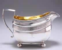 A GEORGE III SILVER CREAM JUG