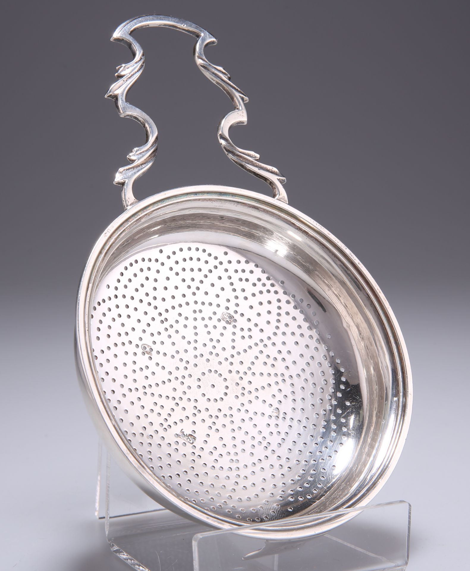 A GEORGE III SILVER LEMON STRAINER