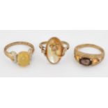 THREE 9CT GOLD GEM-SET RINGS