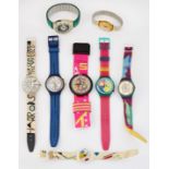 A GROUP OF EIGHT ASSORTED SWATCH WATCHES