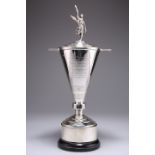 AN ART DECO SILVER TROPHY AND COVER ON STAND