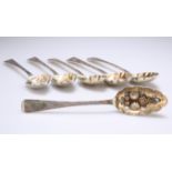 A SET OF SIX VICTORIAN SILVER-GILT BERRY SPOONS