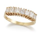 AN 18CT GOLD DIAMOND HALF HOOP RING