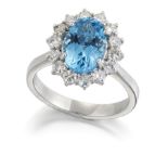 A BLUE TOPAZ AND DIAMOND CLUSTER RING