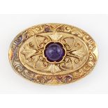 A 14 CARAT GOLD AMETHYST BROOCH