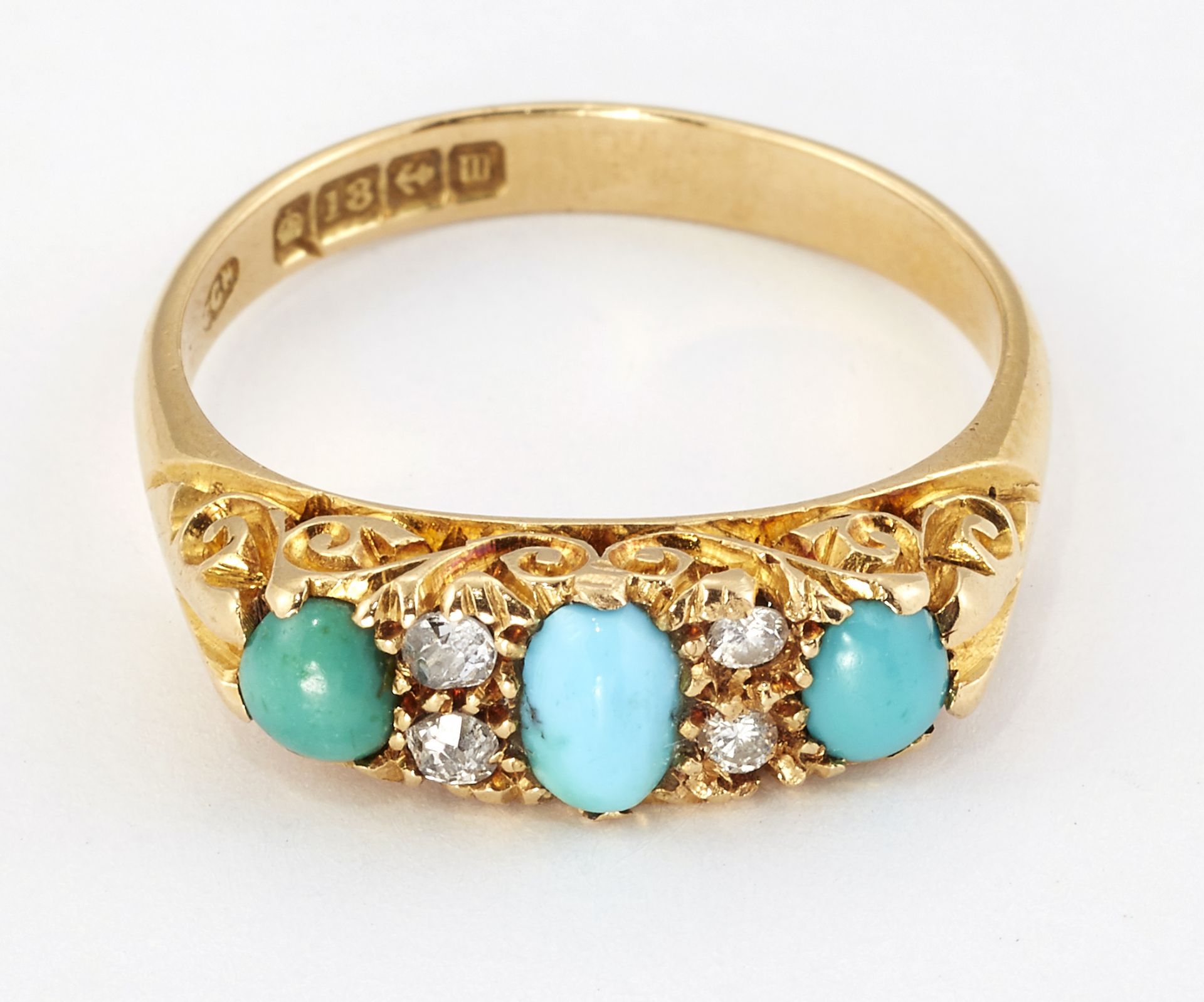 AN 18CT GOLD TURQUOISE AND DIAMOND RING