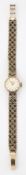 A LADY'S 9 CARAT GOLD LONGINES BRACELET WATCH