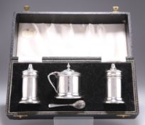 A GEORGE VI SILVER THREE-PIECE CRUET SET