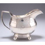 A PROVINCIAL GEORGE III SILVER CREAM JUG