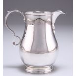 A GEORGE V SILVER CREAM JUG