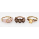 THREE 9CT GOLD GEM-SET RINGS