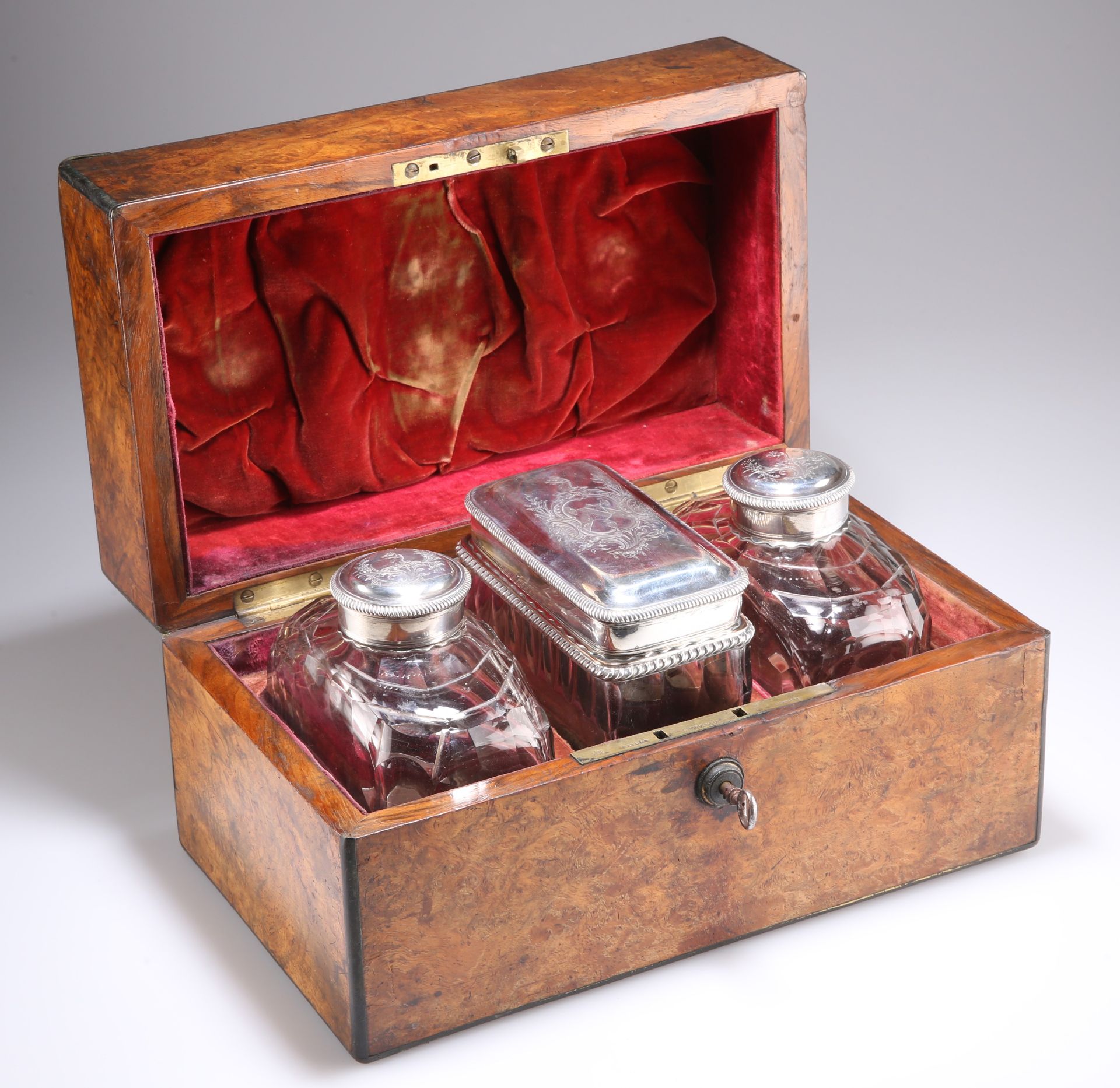 A SET OF THREE GEORGE III CUT-GLASS TEA CADDIES