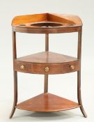 A GEORGE III MAHOGANY CORNER WASH STAND