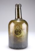 A GEORGIAN GREEN GLASS SEAL WINE BOTTLE