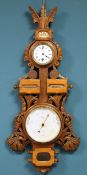 A VICTORIAN CARVED OAK CLOCK, CALENDAR AND BAROMETER