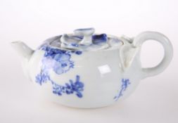 A SMALL BLUE AND WHITE EWER AND COVER