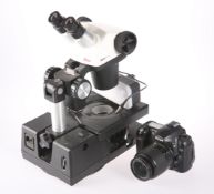 A LEICA STEREOZOOM GEMOLITE GEMMOLOGICAL MICROSCOPE; ND A NIKON D50 DSLR DIGITAL CAMERA