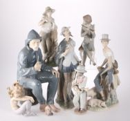 A LLADRO FIGURE OF A SEATED FLAUTIST