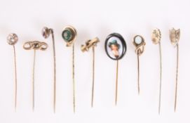 NINE VARIOUS STICK PINS