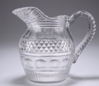 AN EARLY 19TH CENTURY CUT-GLASS WATER JUG