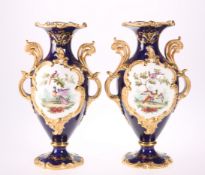 A PAIR OF CONTINENTAL PORCELAIN VASES