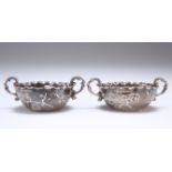 A SMALL PAIR OF SILVER TWO-HANDLED BOWLS