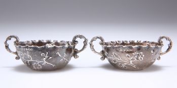 A SMALL PAIR OF SILVER TWO-HANDLED BOWLS