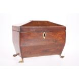 A 19TH CENTURY FIGURED MAHOGANY SARCOPHAGUS TWO DIVISION TEA CADDY