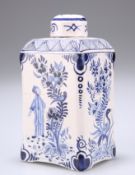 A DUTCH DELFT BLUE AND WHITE TEA CADDY AND COVER