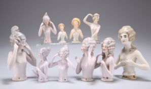 TEN VARIOUS EARLY 20TH CENTURY CONTINENTAL PORCELAIN PIN CUSHION DOLLS