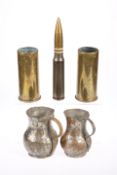 TWO JET ENGINE BRASS STARTER SHELL CASINGS