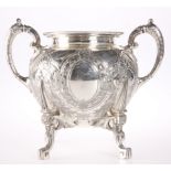 A LARGE SILVER PLATED TWO HANDLED SUGAR BOWL