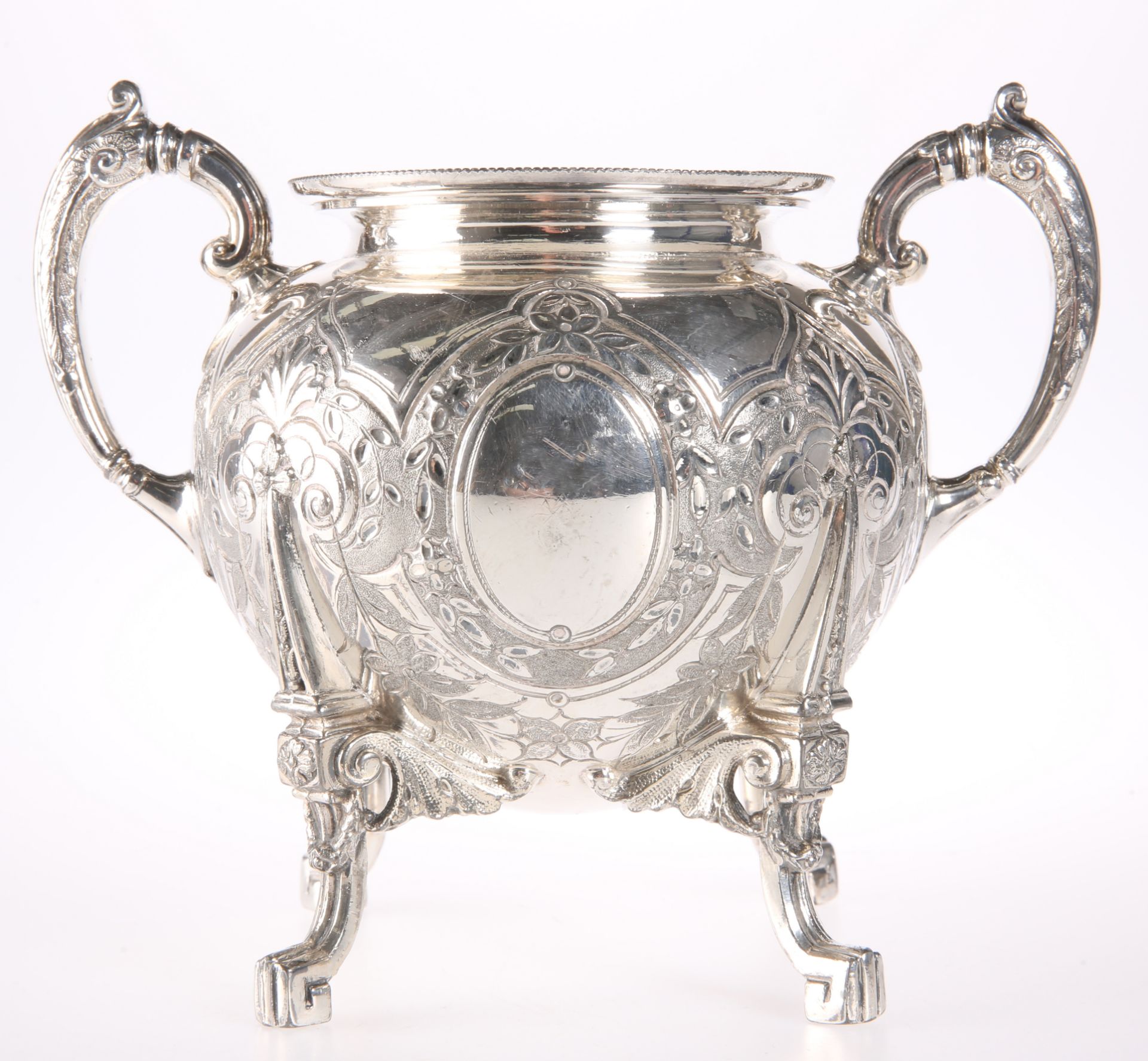 A LARGE SILVER PLATED TWO HANDLED SUGAR BOWL