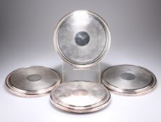 A SET OF FOUR CHRISTOFLE SILVER-PLATED LARGE COASTERS