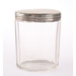 A SILVER MOUNTED GLASS JAR
