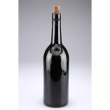 A 1977 Grahams Port bottle, of dark brown glass, 30cm high