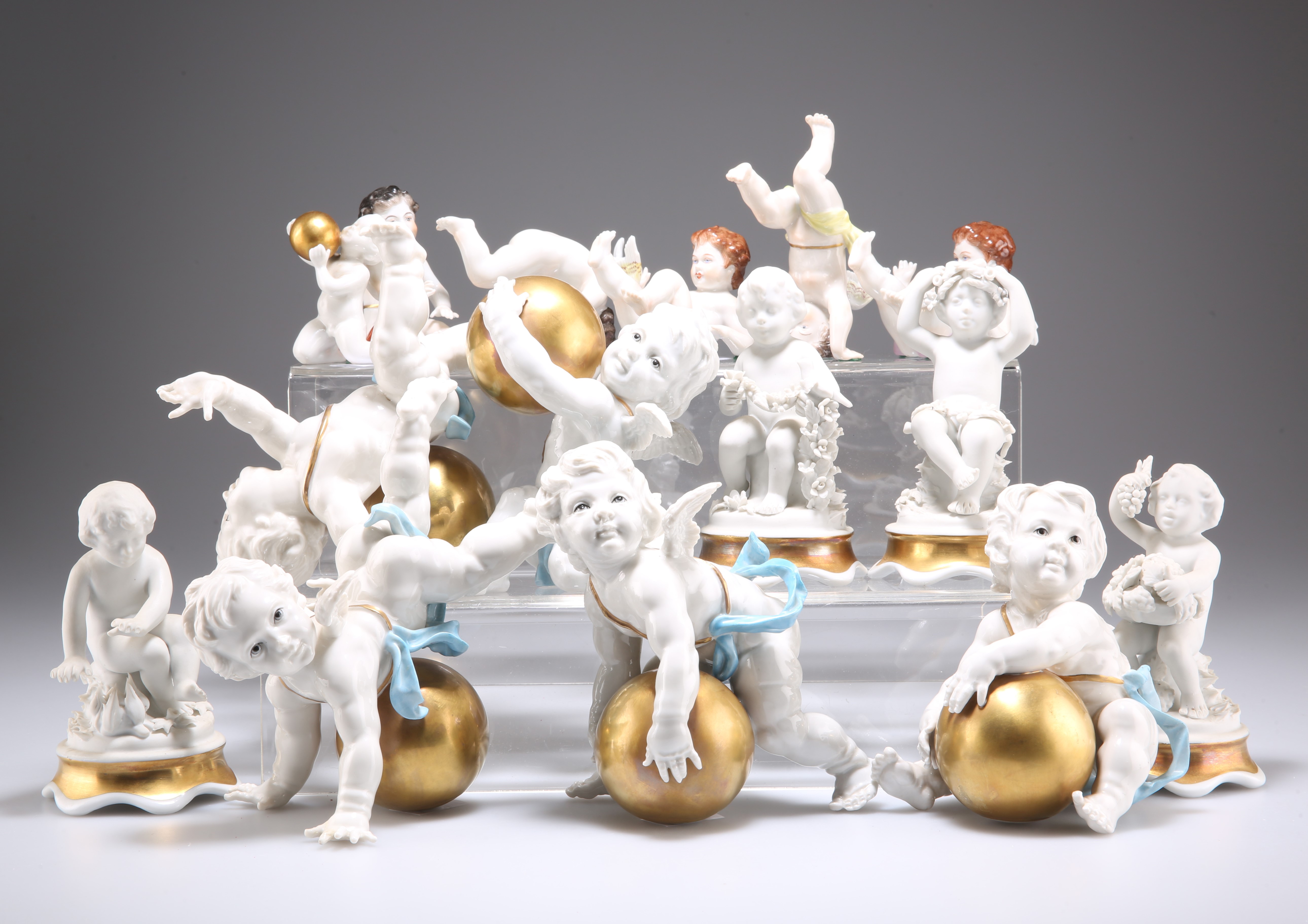 FIVE ALGORA PORCELAIN PUTTI