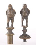 TWO BRASS FIGURAL SEAL HANDLES