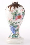 A SMALL BALUSTER SHAPED VASE