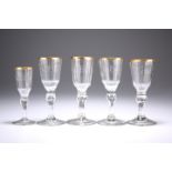 FOUR EARLY 19TH CENTURY WINE GLASSES AND A SINGLE LIQUEUR GLASS